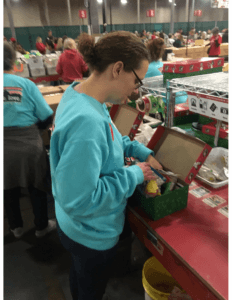 Stacey Junkin packing shoeboxes